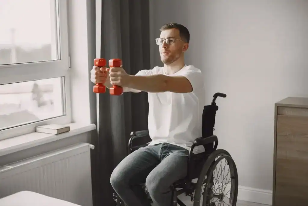Image of man doing exercise in his wheelchair to aid weight loss Luton